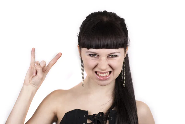Angry woman with characteristic heavy metal hand gesture — Stock Photo, Image