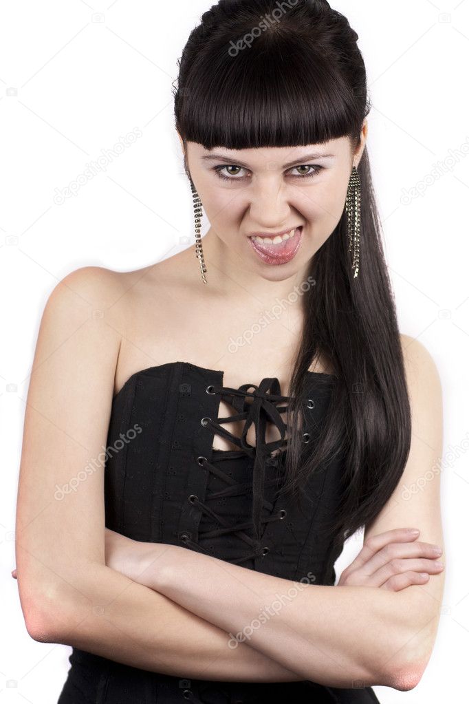 Portrait of expressive woman with her tongue out