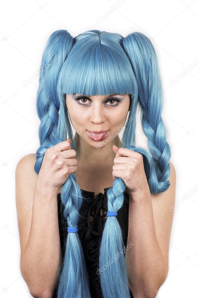 Expressive woman with her tongue out in blue wig