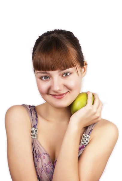 Молодая милая женщина держит зеленое яблоко — стоковое фото