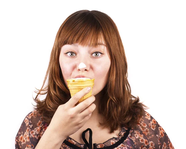 Portrait of funny pretty girl eating ice-cream isolated — Stock Photo, Image