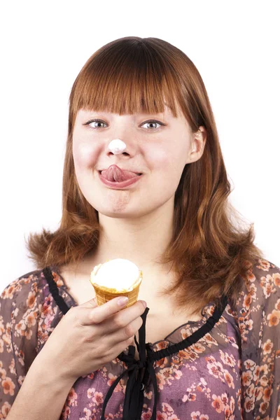 Portrait of funny expression girl eating ice-cream isolated — Stock Photo, Image