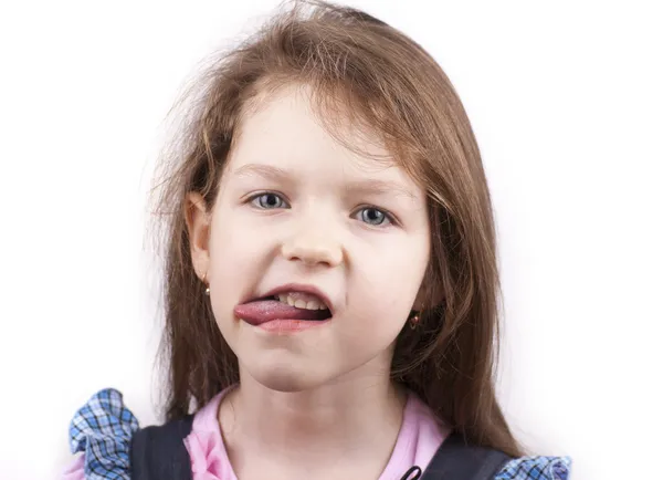 Micuta zambind destul de fata cu limba ei aproape — Fotografie, imagine de stoc