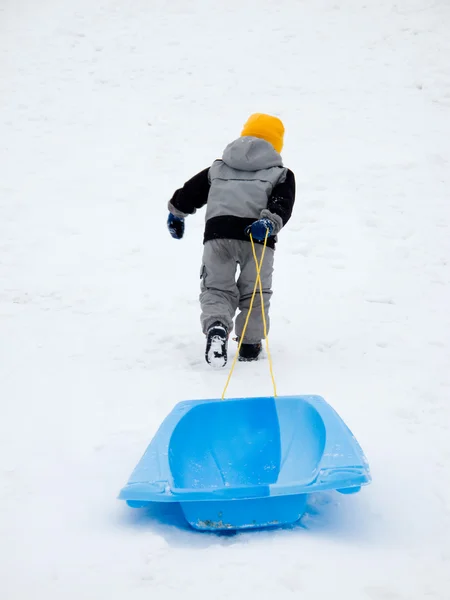 Boy playing in winter — Stock Photo, Image