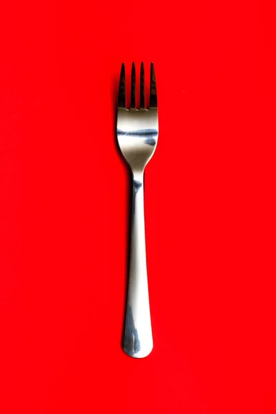 Forchetta su rosso — Foto Stock