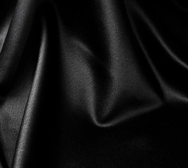Чёрный атласный фон — стоковое фото