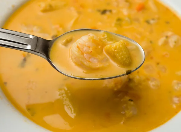 stock image Spoon full of soup and shrimp