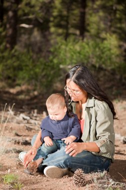 Mother and baby in nature clipart