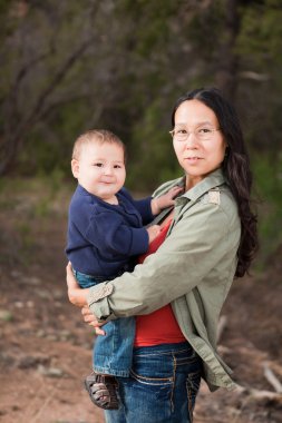 Mother and baby in nature clipart