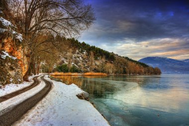 Lake scene in winter clipart