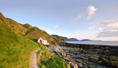 Path to White Cottage on a coast - Niarbyl clipart