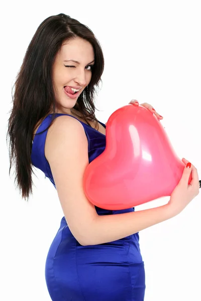 stock image Portrait of a beautiful girl with a red balloon in her hands