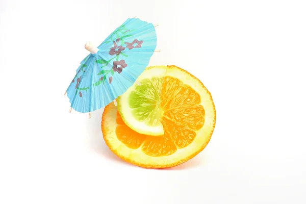 Orange with cocktail umbrella — Stock Photo, Image
