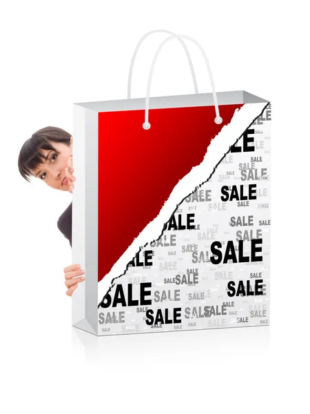 Mulher de negócios atrás de um saco de compras — Fotografia de Stock