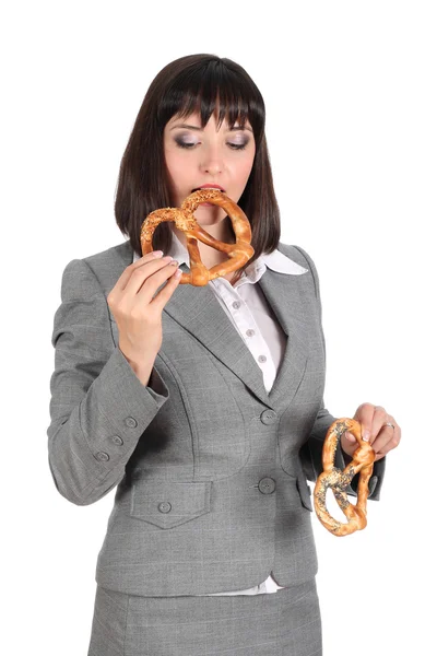 Young woman offer a pretzel — Stock Photo, Image