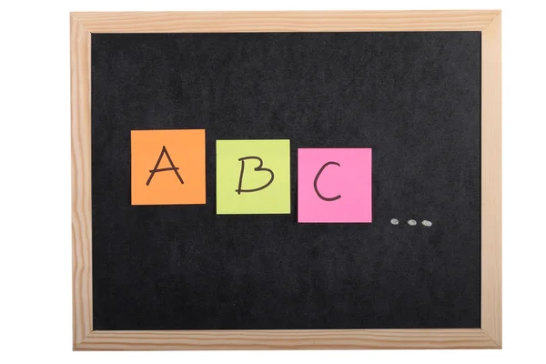 Alphabet letters on blackboard — Stock Photo, Image