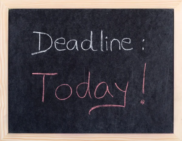 Today deadline written on blackboard — Stockfoto