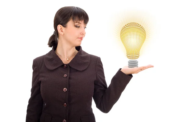 Business woman with lightbulb in hand — Stock Photo, Image