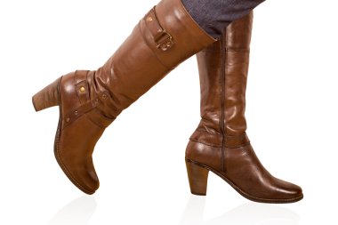 Brown woman's boot isolated on white background clipart