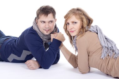 Man and woman doing arm wrestling clipart