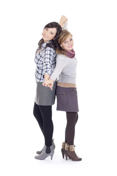 Two women posing in studio — Stock Photo, Image