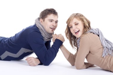 Man and woman doing arm wrestling clipart