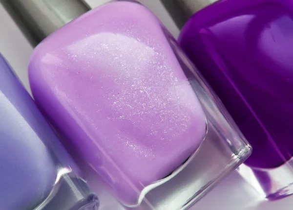 Esmalte de uñas. Lila, rosa, violeta — Foto de Stock