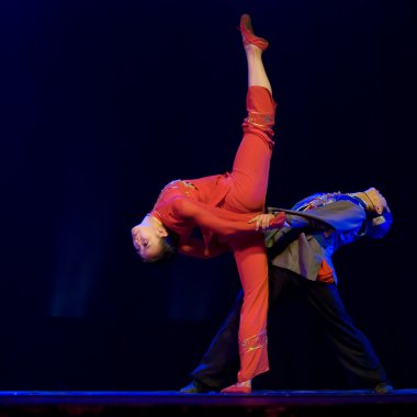 Chinese dancers perform modern duo dance clipart