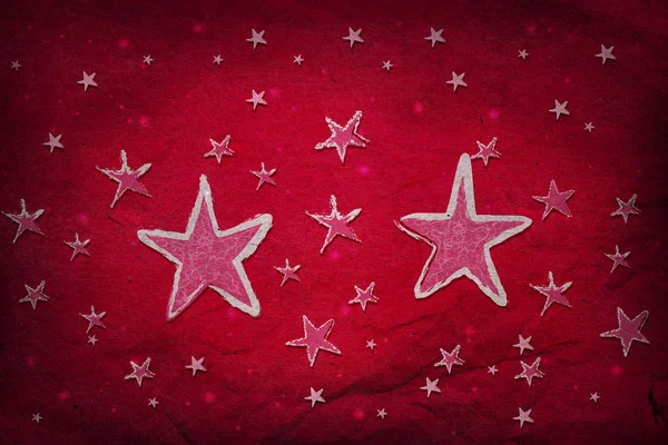 Estrelas em papel vermelho — Fotografia de Stock