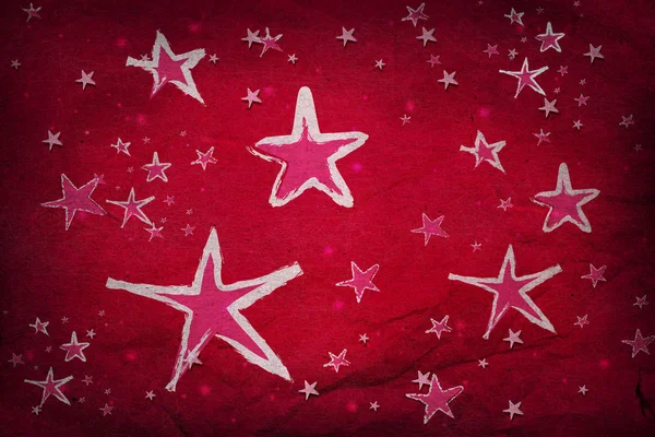 Estrellas sobre papel rojo —  Fotos de Stock