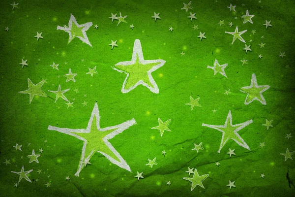 Estrellas sobre papel verde — Foto de Stock