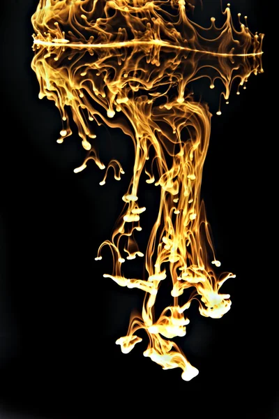 Ink in water black and yellow — Stock Photo, Image