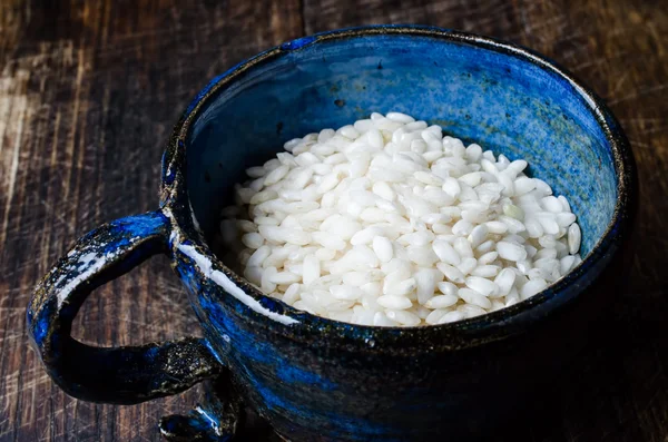 Risotto in blue cup — Stock Photo, Image