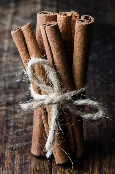 Tied cinnamon sticks — Stock Photo, Image