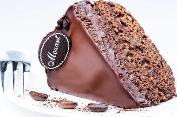 Pedazo de pastel de chocolate en blanco — Foto de Stock