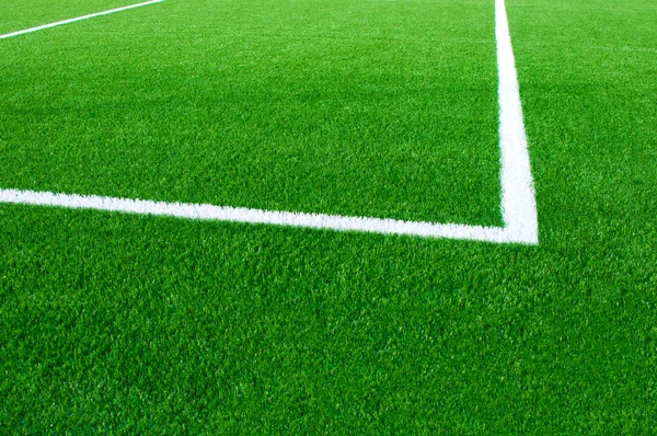 Campo de futebol fragmento de perto — Fotografia de Stock