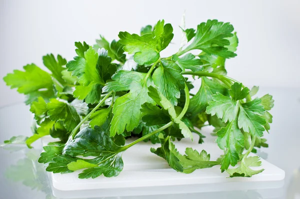 Parsley on cutting board — Stock Photo, Image