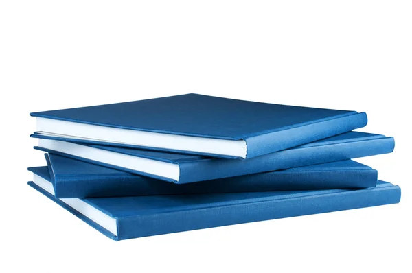 Cuatro bloc de notas azules sobre fondo blanco aislado —  Fotos de Stock