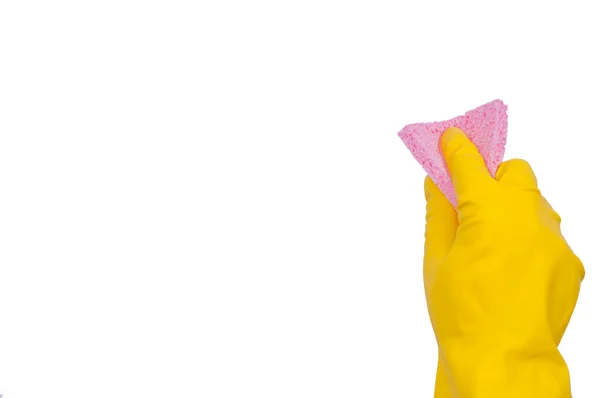 Mano en guante amarillo con esponja rosa — Foto de Stock