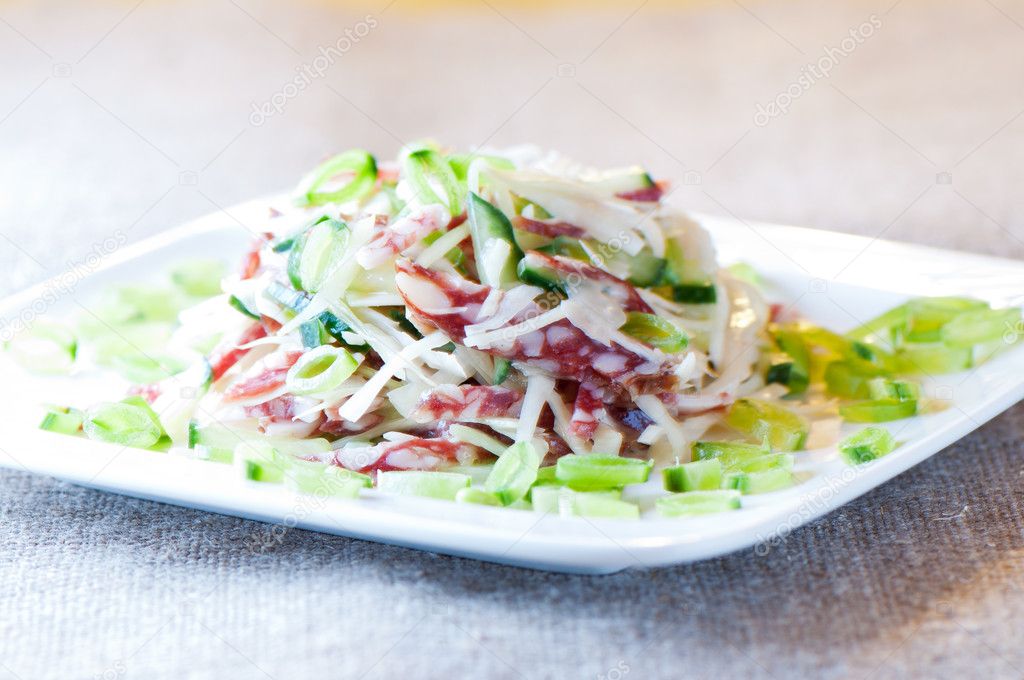 Cabbage salad,cucumber, sausage and green peas
