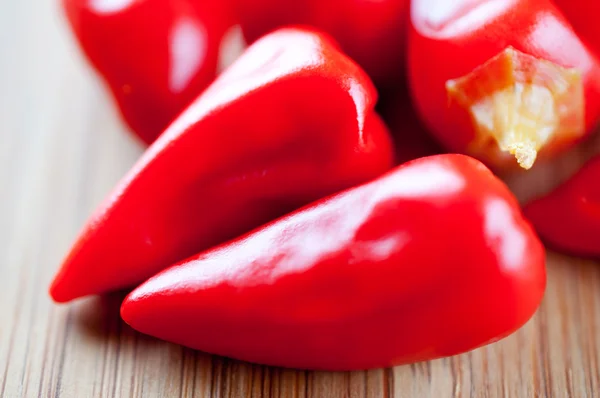Canned chili pepper on a cutting board — Stock Photo, Image
