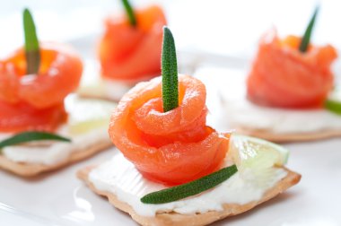 Canapes with smoked salmon and cream cheese clipart