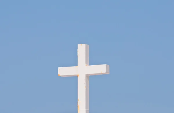 stock image Christian cross on blue sky background