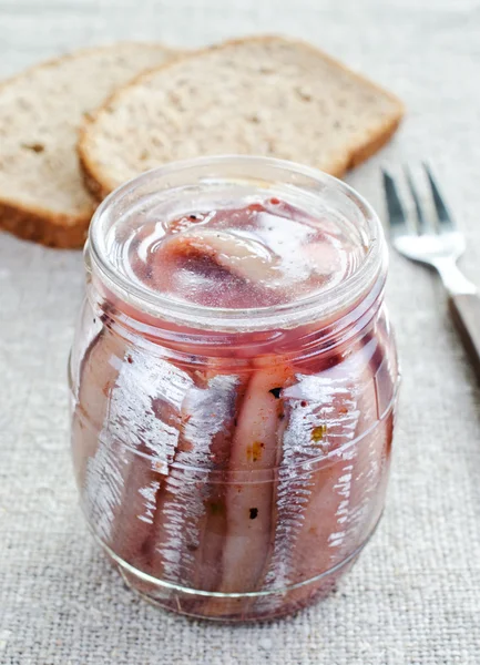 stock image Herring in a glass jar