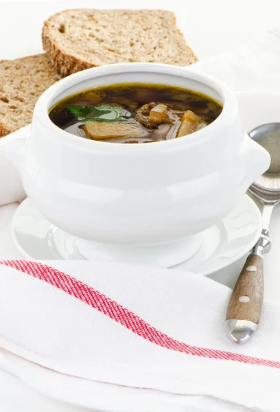 Bowl of mushroom soup on a cloth — Stock Photo, Image