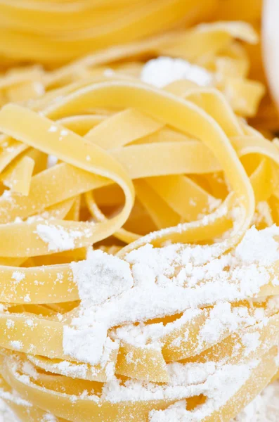 Italian pasta and flour — Stock Photo, Image