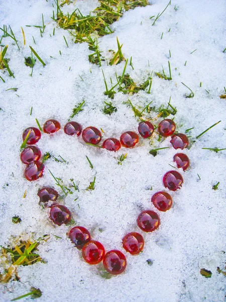 Heart is melting the snow — Stock Photo, Image