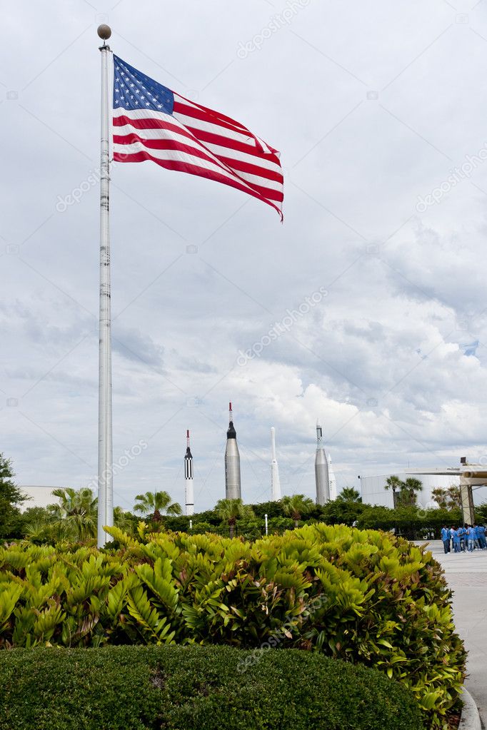 American flag near entrance to Kennedy Space Center. Rocket gard