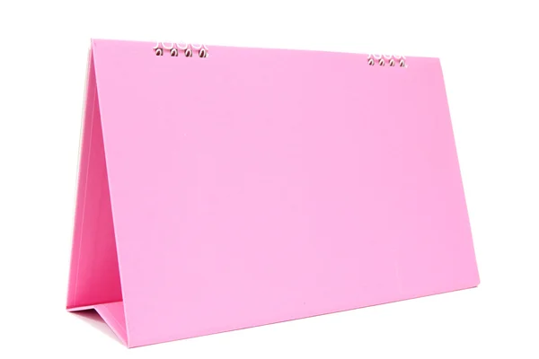 Розовый пустой календарь рабочего стола с изолированным на белом фоне — стоковое фото