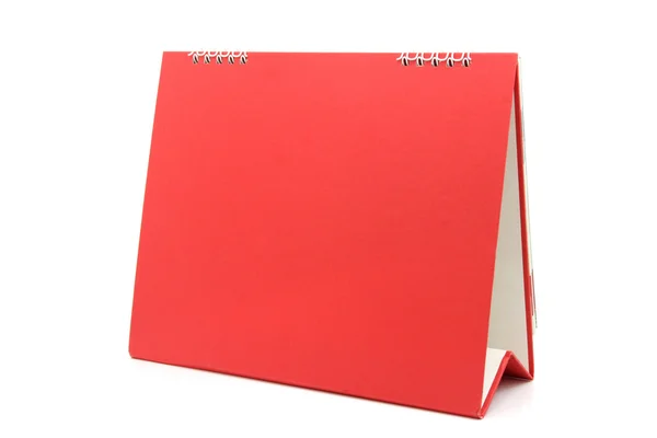 A elszigetelt fehér háttér piros üres asztali naptár — Stock Fotó